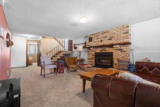 Highlighted by the fireplace that was converted to gas!