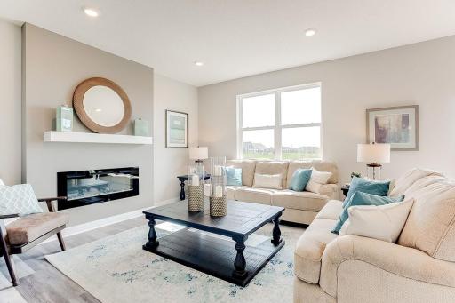 Large inviting living room to host gatherings or just for evening relaxation. Make this space your home. *Photos are of model home. Actual finishes may vary.