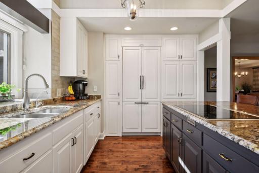 The kitchen remodel includes upgraded appliances and DW and refrigerator with cabinet fronts