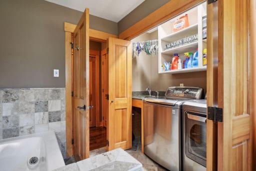 Laundry area is conveniently located in the main floor suite