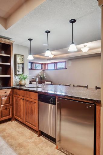 The lower level wet bar has everything you need for entertaining!