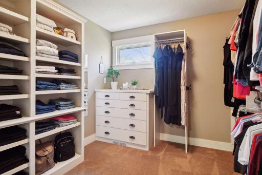 Amazing built-in closet organizers eliminate the need for dressers in the main area