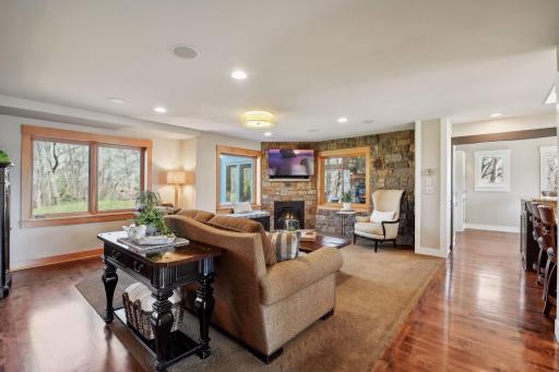 Informal living room has one of four fireplaces!