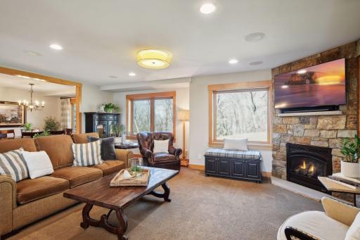 Large windows act as your artwork while featuring the beautiful changing seasons you will experience daily!