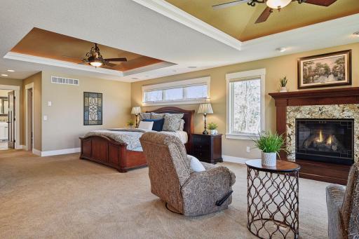 Notice the detail of the two coved ceilings, each complete with lights and ceiling fans