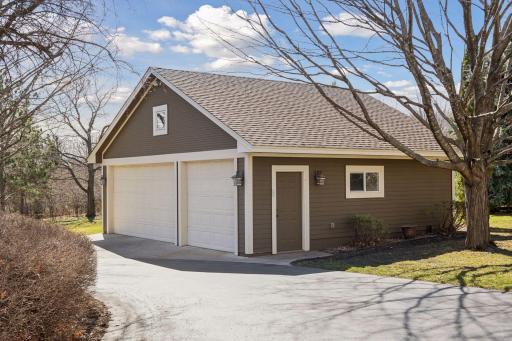 The detached garage offers 3 additional parking spots and has lots of room for your outdoor and lake toys