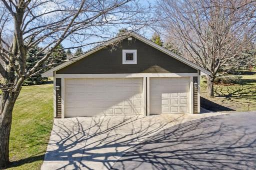 A second detached garage offers an additional 3 parking spots