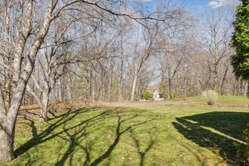 This lot combines the perfect blend of wooded areas and open spaces