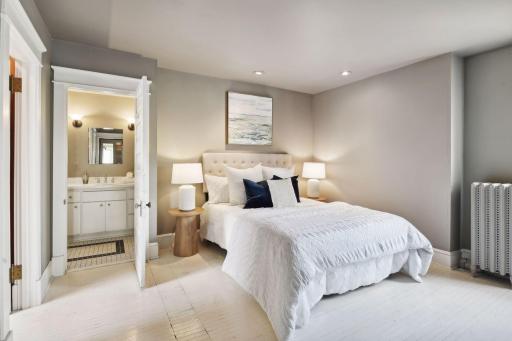 Comfort and convenience in this inviting second bedroom, complete with its own private bathroom—a perfect retreat for guests or family members.