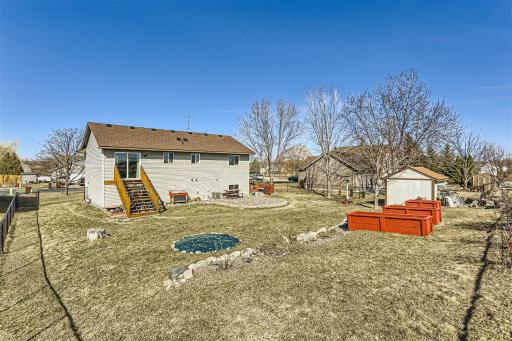 Huge fully fenced back yard with a storage shed!