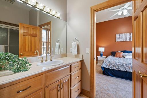Connected by a stylish jack & jill style bathroom equipped with a tub/shower combo, offering both functionality and convenience.