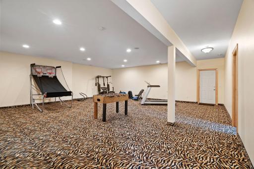 Bonus room with surround sound and separate access to the garage, providing endless possibilities for leisure and entertainment.