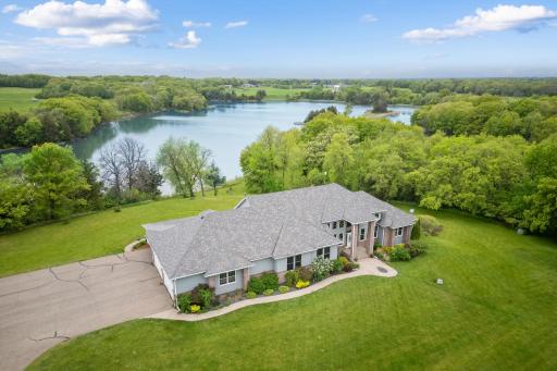 Access the attached 4+-car garage conveniently from the main level, providing ample space. Stairs lead to the garage loft, offering extra storage space for belongings or customization options.