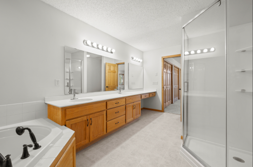 Dual sinks, quartz countertops, new fixtures/shower