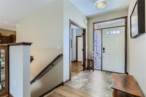 The bright, open entryway is spacious and welcoming.
