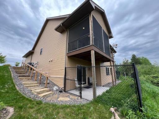 Fenced in portion of back yard with access from walkout.