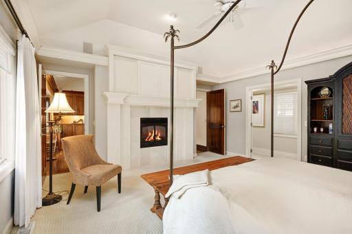 Gas fireplace warms both the primary bedroom as well as the adjacent study.