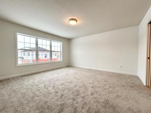 Primary Suite of a similar home and floor plan. Options, colors and features may vary.