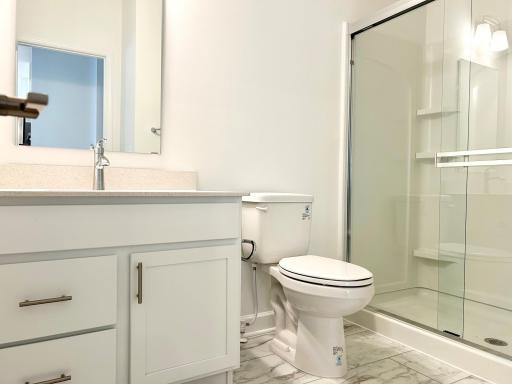 Main Floor Bath of a similar home and floor plan. Options, colors and features may vary.