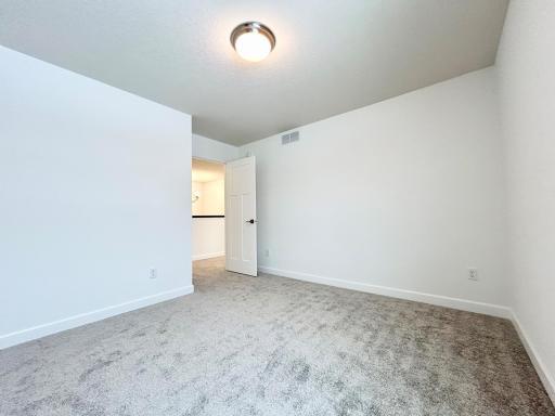 Guest Bedroom 2 of a similar home and floor plan. Options, colors and features may vary.