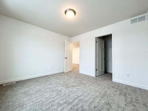 Guest Bedroom 3 of a similar home and floor plan. Options, colors and features may vary.