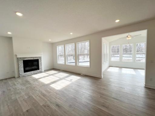 Great room and 4 season porch! So many trees!