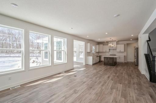 Great room, 4 season porch and gourmet kitchen.jpg