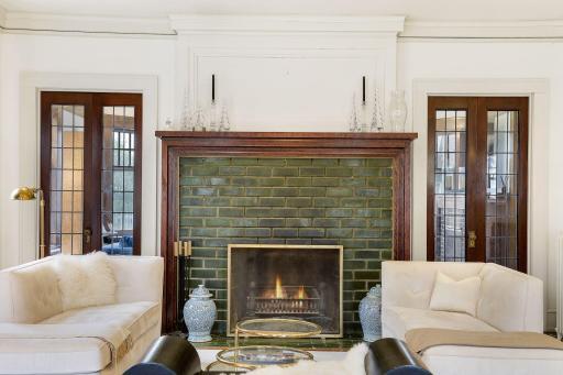 Gorgeous wood-burning fireplace with tile surround.