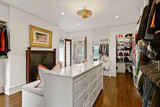 Stunning Dressing Room with Gas Fireplace and Built-in Chaise Lounge