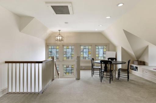 Beautifully Finished and Highly Functional 3rd Floor. Gorgeous Stained Glass Windows offer Privacy, Light, and Beauty.