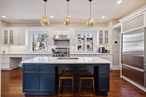 Light filled kitchen. Kitchen island with seating.