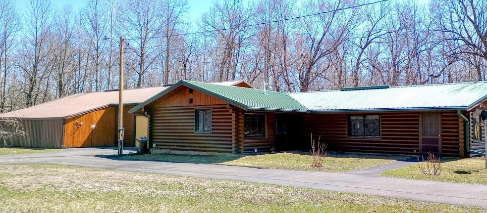 Beautiful 2 bed/1 bath Log Home on 1+ acres, includes 4 extra lots