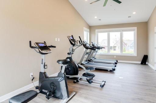 Clubhouse fitness center includes cardio machines, bench and dumbbells. Everything you need for a great workout!