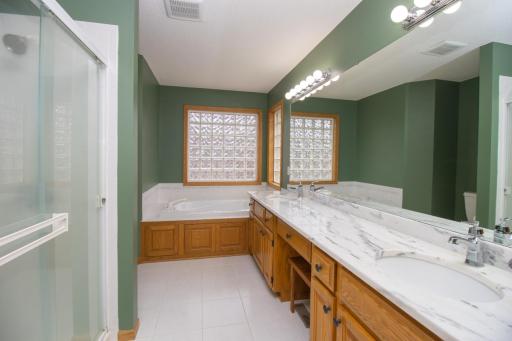 Primary bathroom with separate tub and shower and dual sinks!