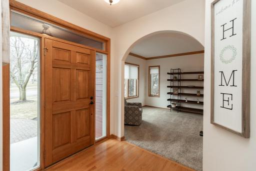 Step inside to the spacious foyer. Hardwood floors, good natural light and convenient storage. Living Room/Den is just beyond.