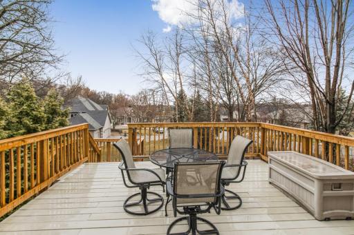 Deck off the informal dining with access to the backyard and playspace!