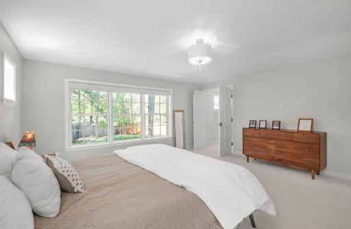 It features abundant natural light, which makes it a great place to relax and unwind. The suite also includes a large walk-in closet and a private bathroom.
