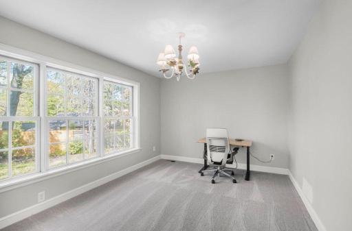 This is bedroom 2 of 4 on the second floor. It has huge windows that let in lots of light.