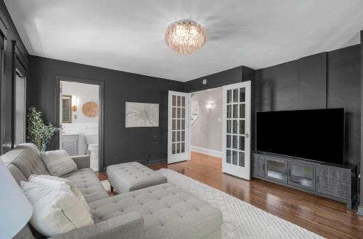 This house has a dramatic bedroom on the main floor with a full bath.