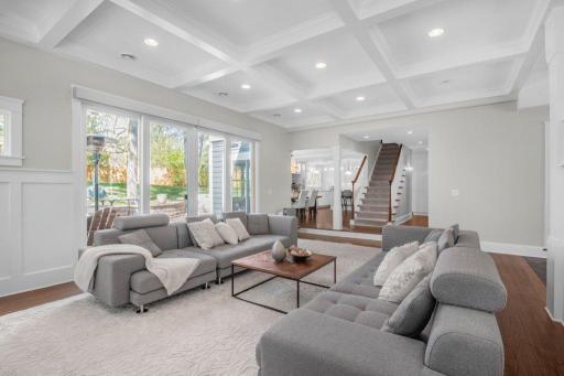 This home features an open floor plan that offers a delightful arrangement for entertaining. The living room, dining room, and kitchen are all open to each other, creating a great space for guests to mingle.