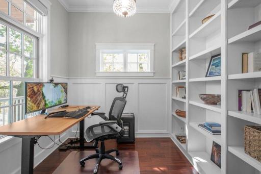 This home office is remarkable. It features exquisite mill work and built-in shelves, making it an ideal location for working from home.