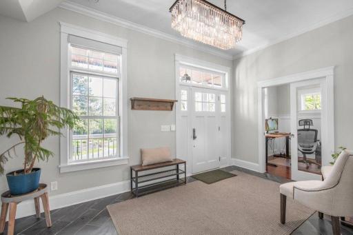 This bright and spacious foyer welcomes you to this beautiful home. With its high ceilings and natural light, this foyer is sure to impress.