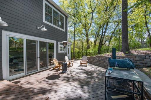 Imagine the BBQs you'll host here! This beautiful backyard is perfect for entertaining. You'll love cooking and dining al fresco.