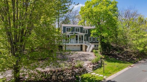 This home has great curb appeal. The beautiful flowers and thoughtful landscaping will delight you from the moment you arrive.