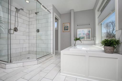 Wow! Calgon take me away! Light, bright, beautiful and so luxurious! Private owner's suite is perfectly situated and allows multiple people to get ready at the same time.