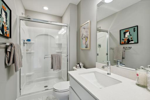 (Photos of model home, finishes will vary) The bathroom connected to the previous room!
