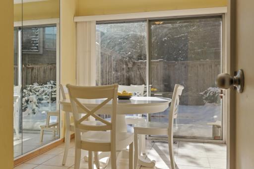 Notice how the dining area flows out onto the private patio