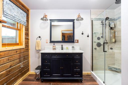 Fully remodeled main floor master bath w/ walk in shower & new vanity & fixtures