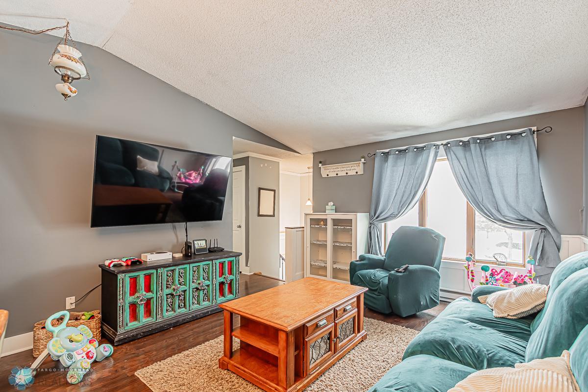 Living Room with dark laminate flooring