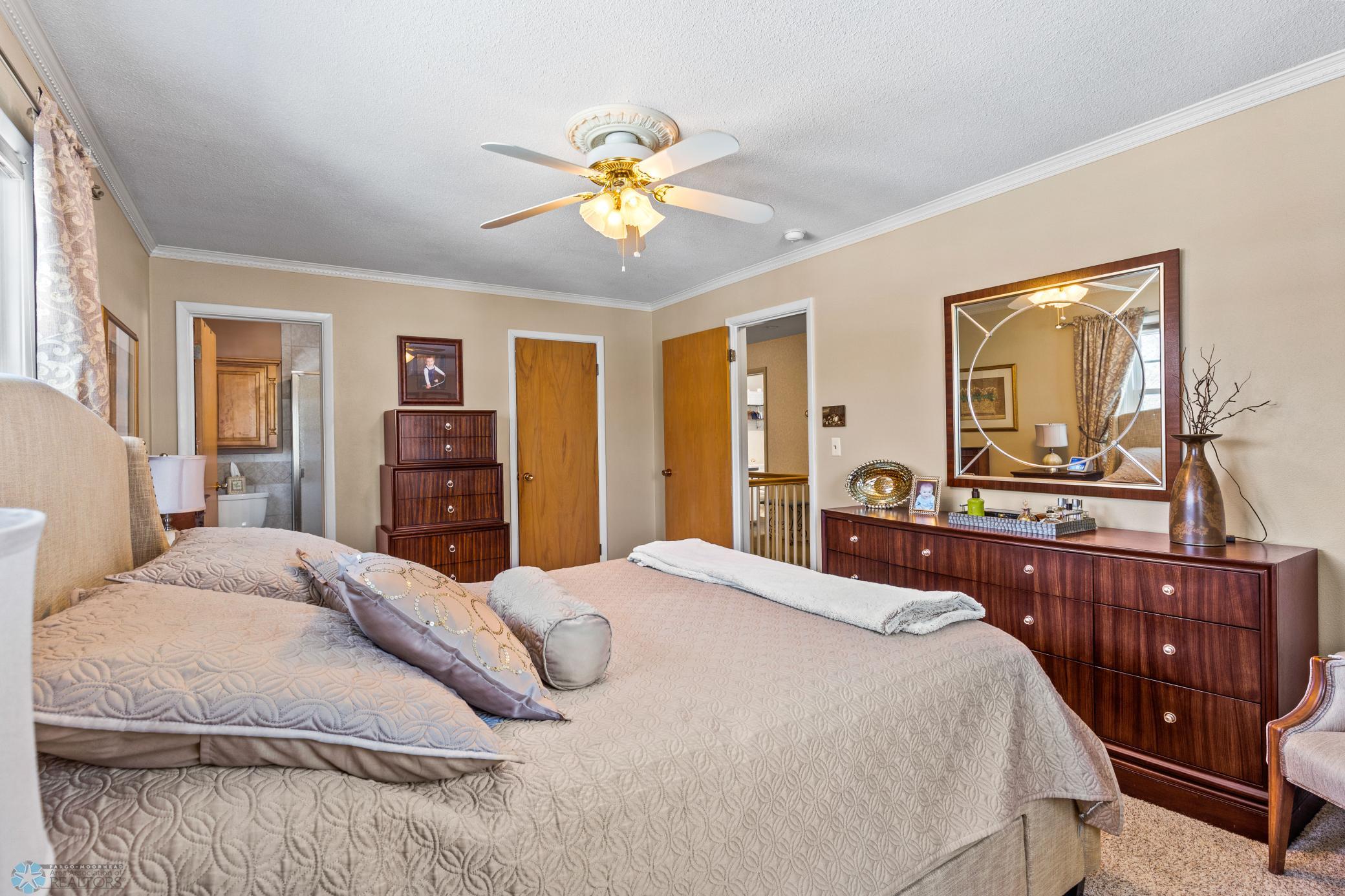 Primary Bedroom with private bath and walk-in closet